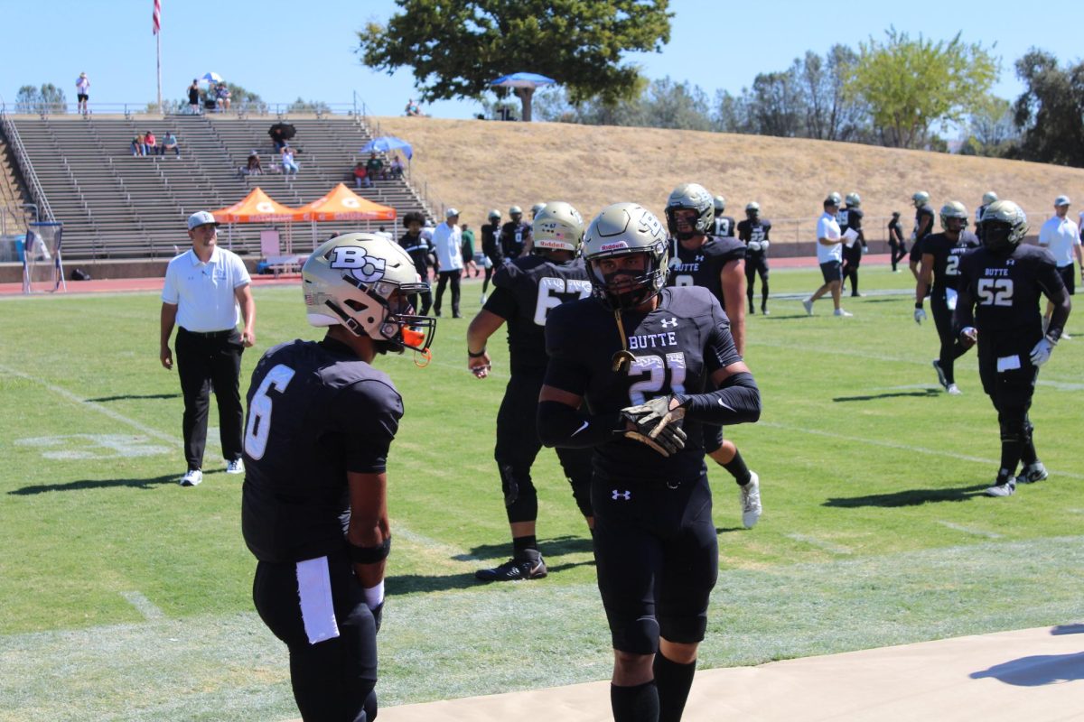 #6 Zach Valcarcel and #21 Jude Mendoza 
talking during pre game.
