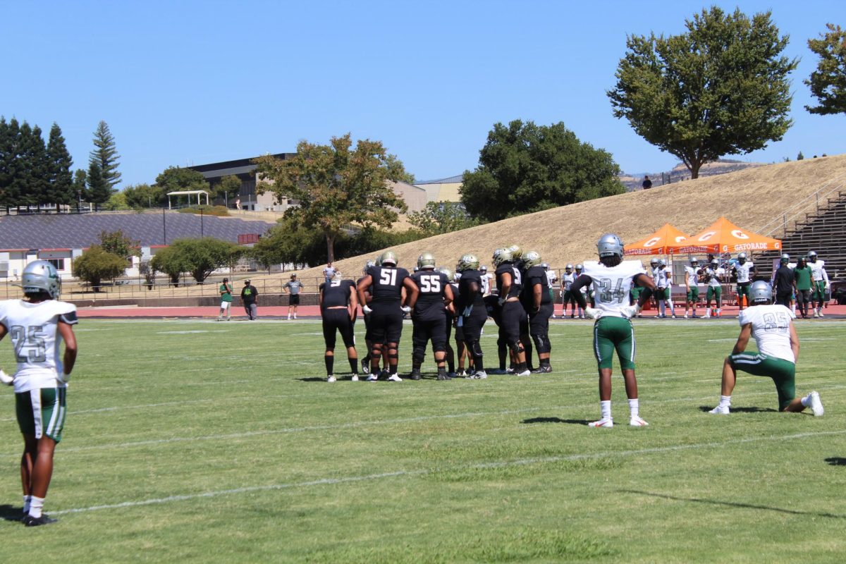 BC's offense in a huddle.