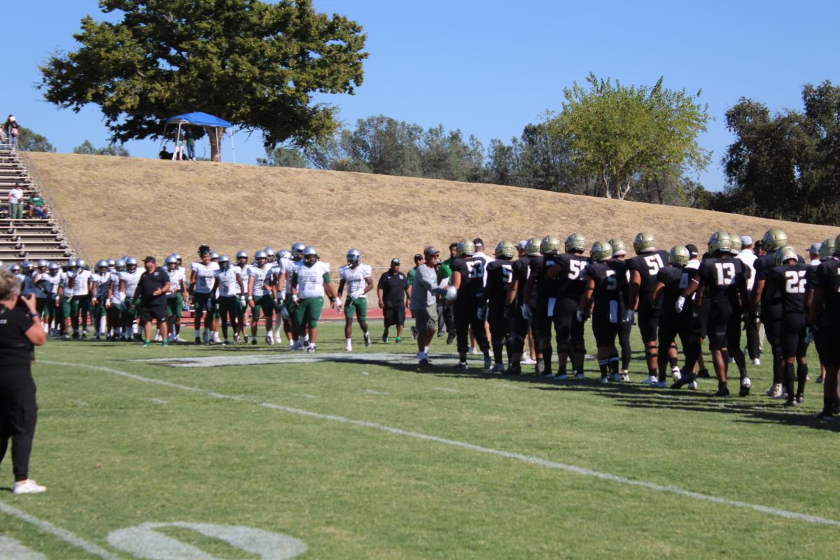 Butte college and Laney lining up to say good game. 