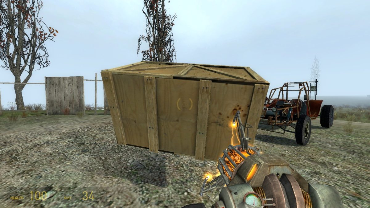 Gameplay of the Gravity Gun holding a crate, "Half-Life 2", Valve Corporation