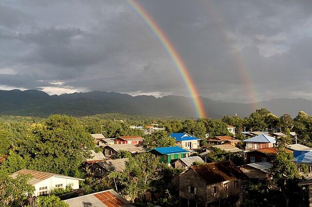 Rainbow over a village in Burma pic via Wikimediacommons 