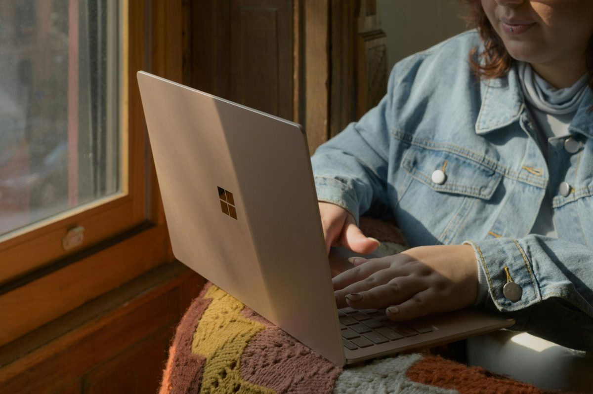 Student working on laptop; via Unsplash