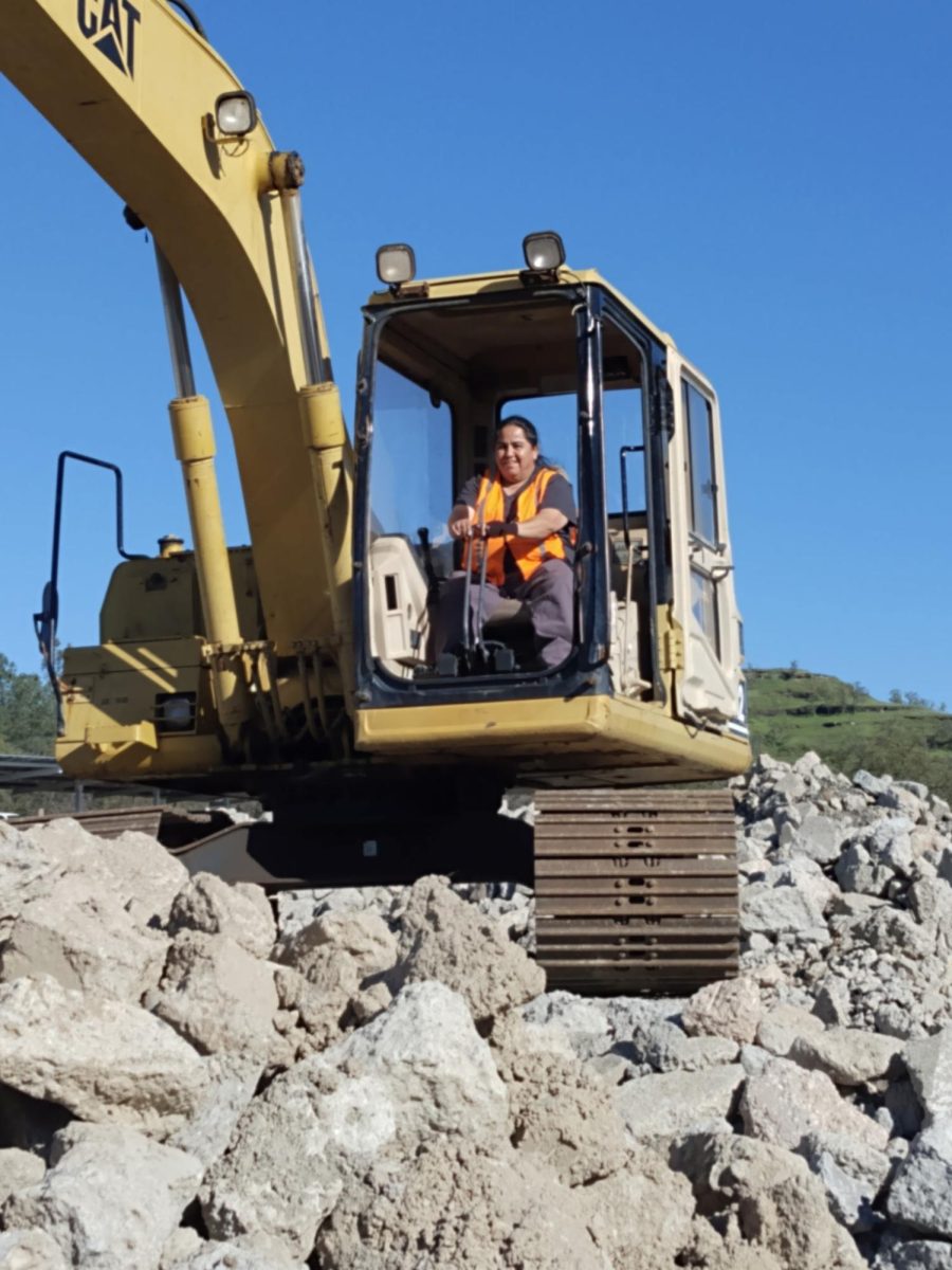 Manuela Gonzalez, age 47, operating an excavator. 2025.