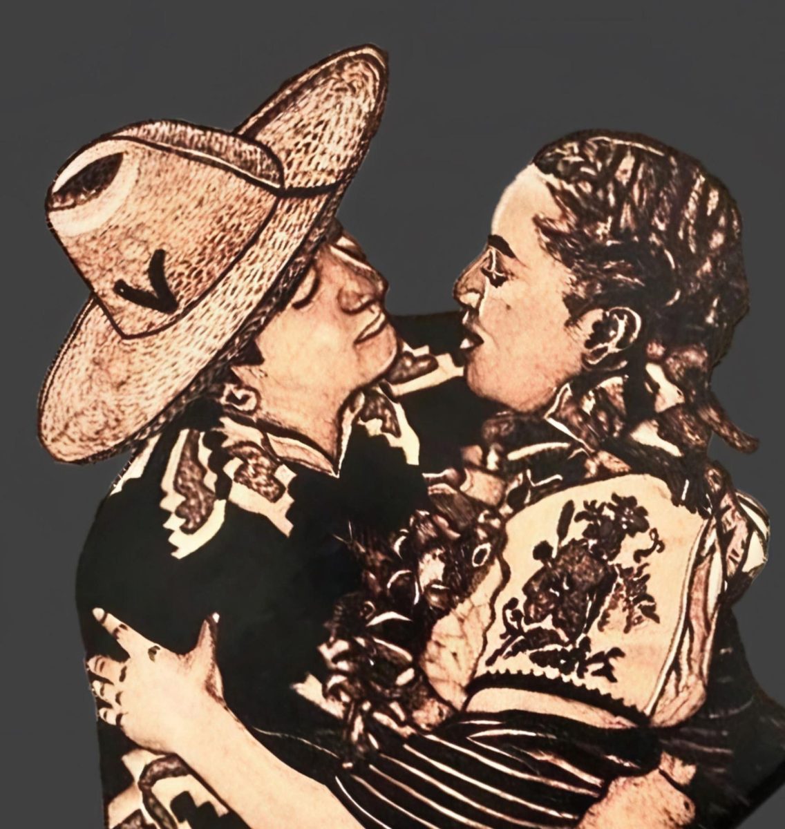 Two  young Purépecha lovers dancing. They are dressed in traditional Purépecha fashion, which emerged after the colonization of the empire by the Spanish. Image was created through a method called pyrography and used with permission.