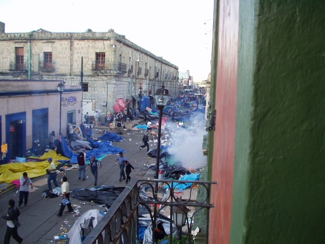 Oaxaca, Mexico 2006 as citizens riot for inclusive economic rights through equal pay and education opportunities. CC CY 2.0 Flickr