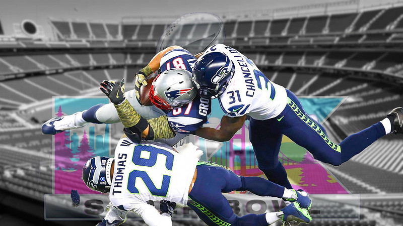 A picture of three NFL players tackling the ball at Super Bowl LX, featuring two Seahawks players; Chancellor #37 and Thomas III #29, and Patriots player Gronkowski #87