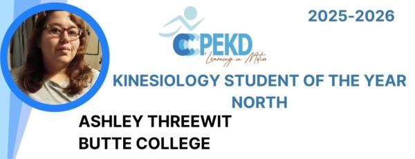 Ashley Pictured next to a "Kinesiology Student Of The Year North" Banner, March 15, 2026