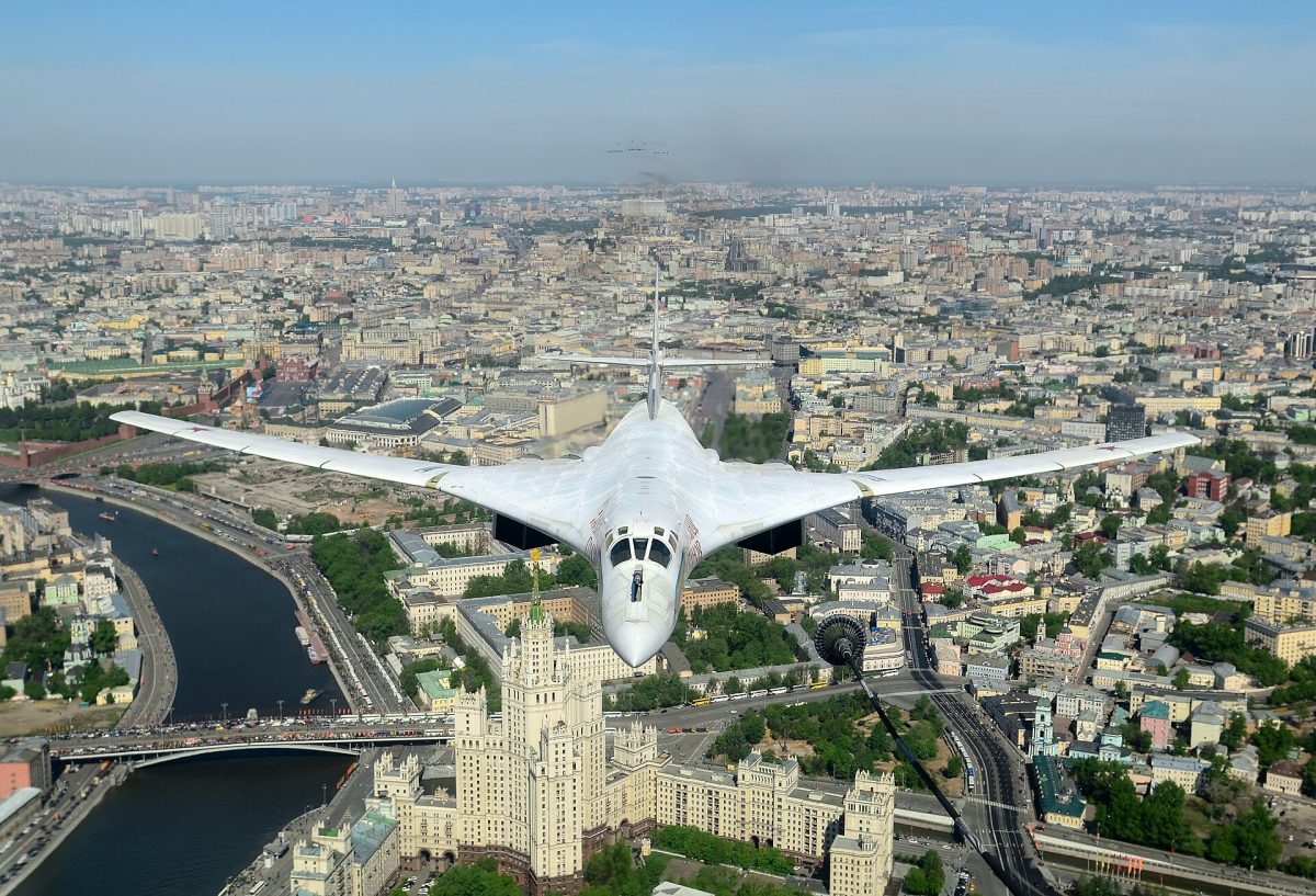 A Tupolev Tu-160 is pictured flying over the skies of Moscow. (Accessed via Wikimedia Commons.)  